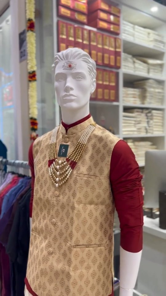 Our modern vest paired with a classic red Kurta and silk Panjakacham dhoti!